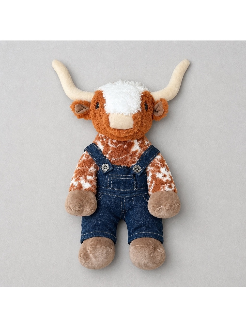 Build-A-Bear Workshop Longhorn steer plush wearing denim overalls. 12in.